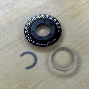 Olympus OM-10 Exposure Counter Dial, Spring and Circlip